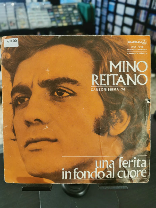 Una Ferita In Fondo Al Cuore – Mino Reitano (Vinile 45 giri)