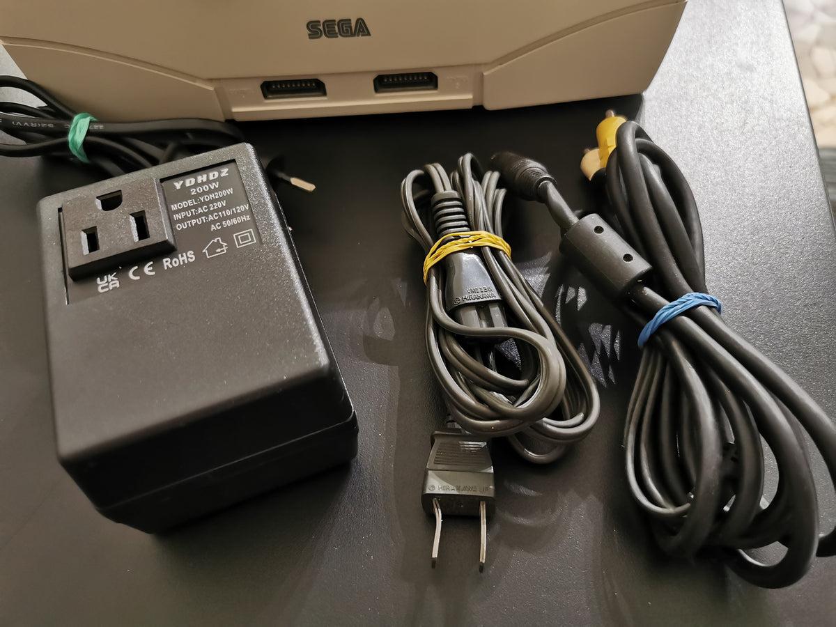 Sega Saturn HST-3220 White NTSC-J + Action Replay 4M Plus + 2 Controller