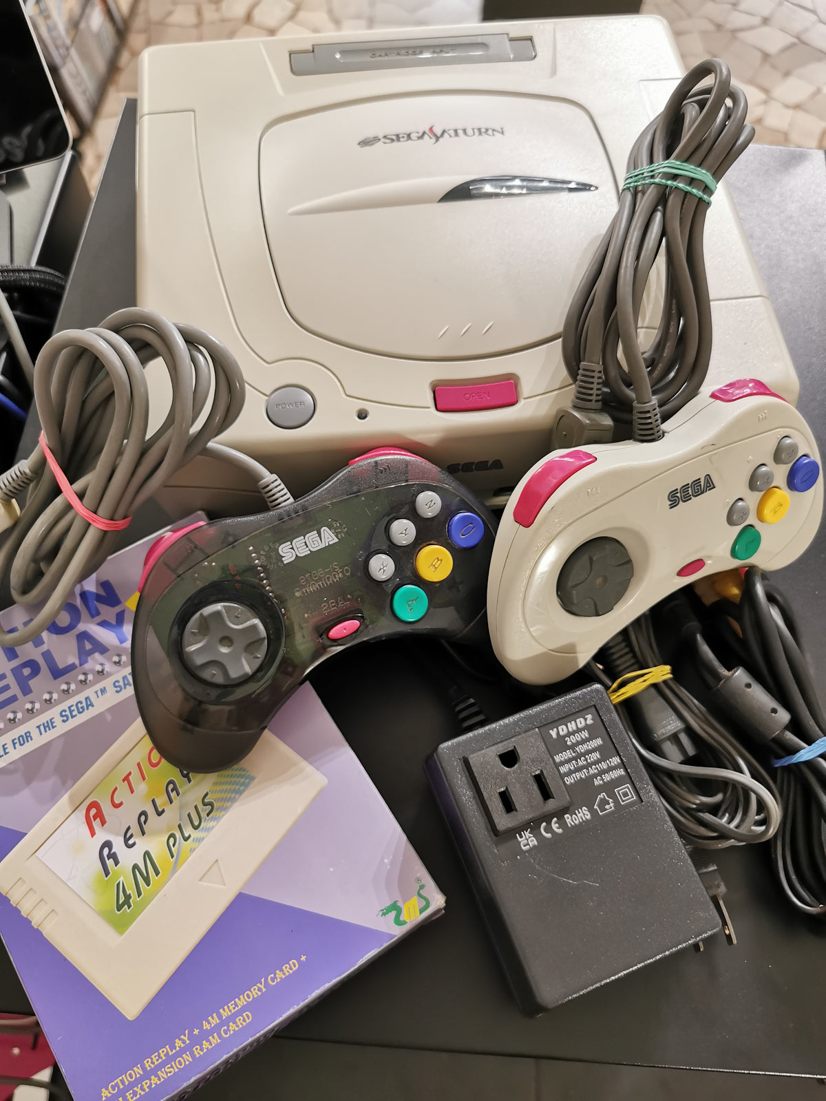 Sega Saturn HST-3220 White NTSC-J + Action Replay 4M Plus + 2 Controller